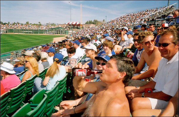 Doug missed Cactus League last season Due to an injury, This is Doug the beer drinker’s first Budweiser of 2006 “I’ll keep em on ice you keep tippin em back”